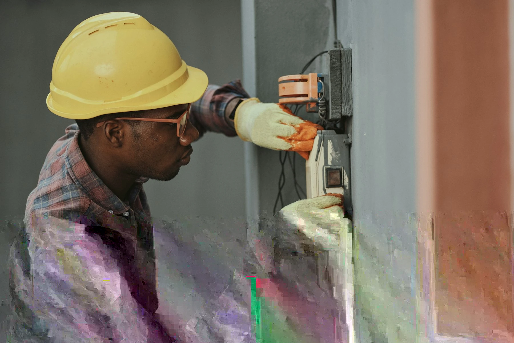 A wall-mounted boiler and copper pipes